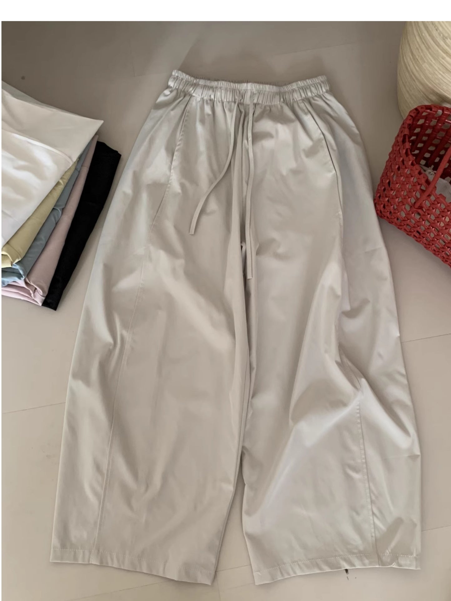 Pantalones sueltos de mujer, corte curvado, cintura alta y pierna recta