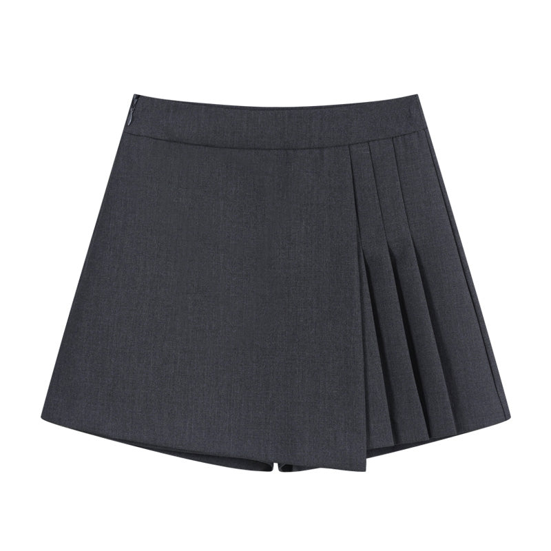 Falda gris de corte irregular con estilo sastre, fresca y moderna para verano