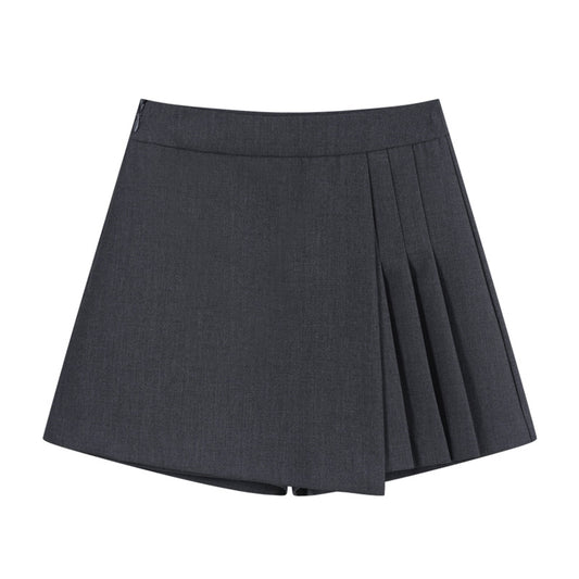 Falda gris de corte irregular con estilo sastre, fresca y moderna para verano