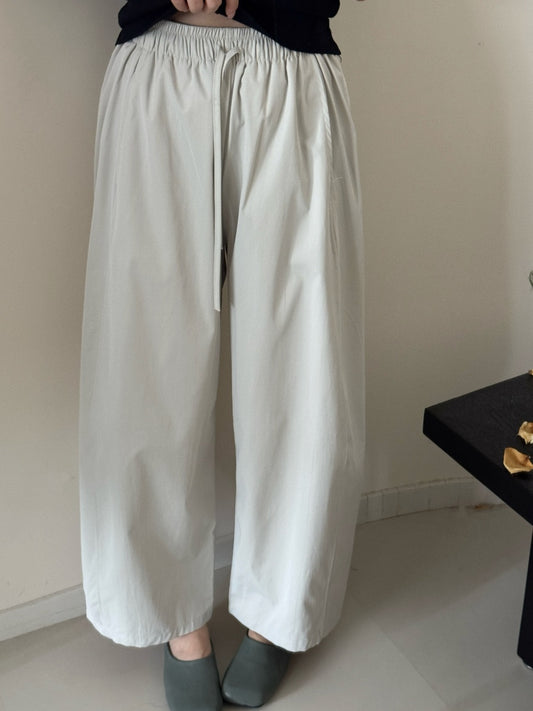 Pantalones sueltos de mujer, corte curvado, cintura alta y pierna recta
