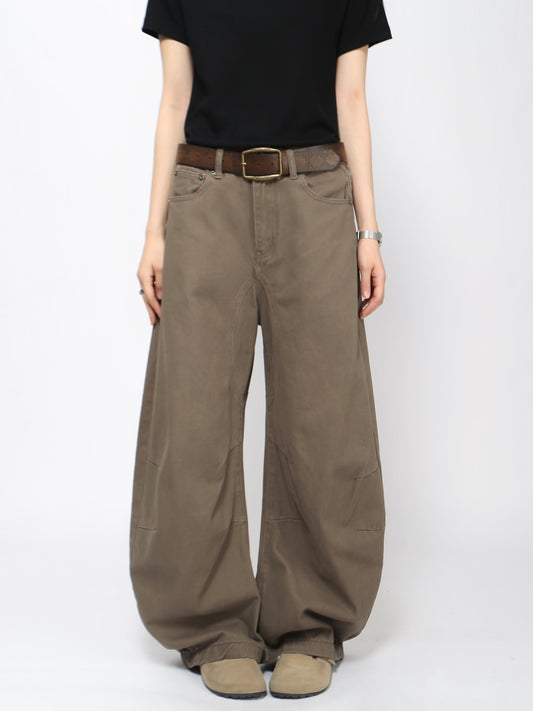 Pantalones vaqueros anchos estilo urbano, corte curvo y efecto arrugado